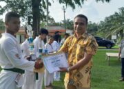 Berhasil Torehkan 7 Gelar Juara Pencak Silat,GM Distrik I Bah Jambi Serahkan Piagam Penghargaan Kepada Anak Didik