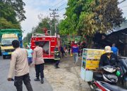 Respon Kilat Polres Simalungun Langsung Evakuasi Korban dan Amankan TKP Kebakaran Bengkel Yang Hanguskan Satu Rumah